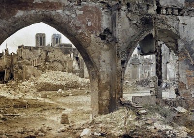 The towers of the Cathedral Notre-Dame de Reims seen through the damaged windows of a downtown building, France, April 3, 1917 by Paul Castelnau